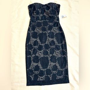 Diosa Black semi backless sheer black dress. size Medium.